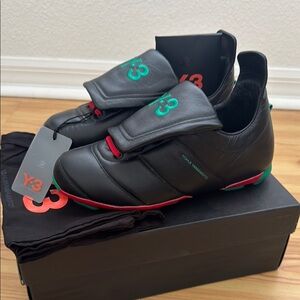 Y-3 Black Athletic Shoes with Green and Red Accents